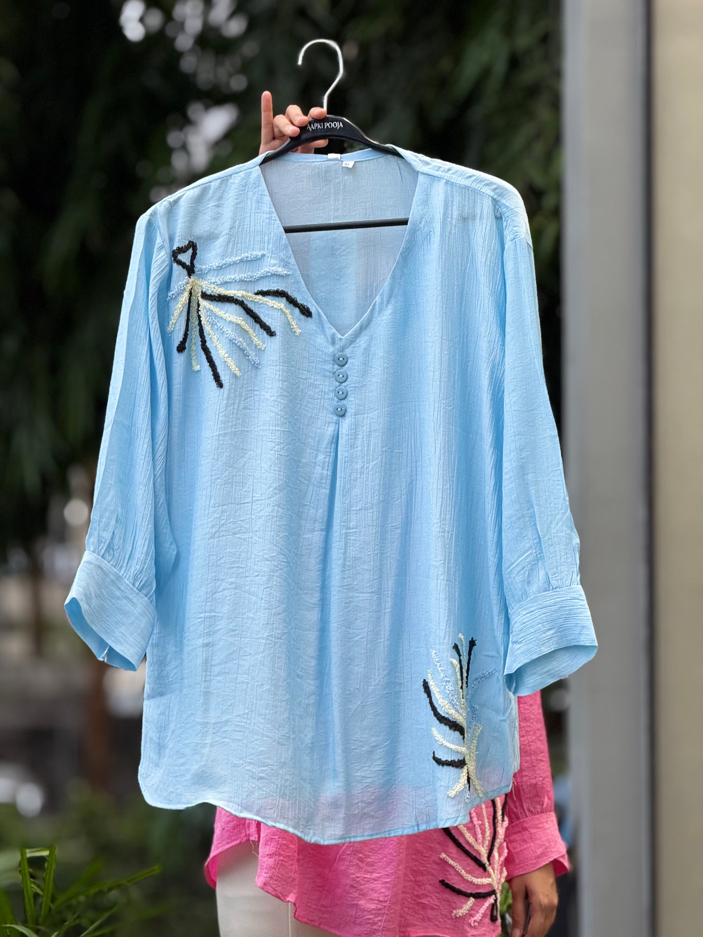 embroidered button detail top.