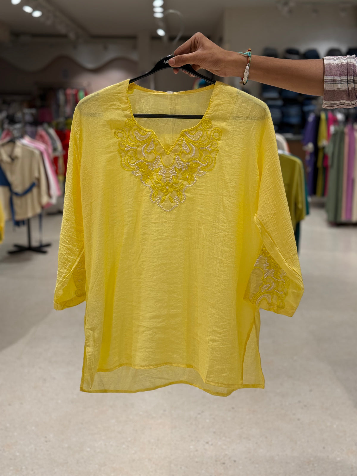 Partywear see through top .