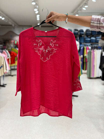 Partywear see through top .