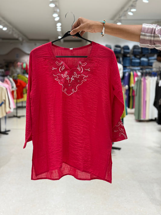 Partywear see through top .