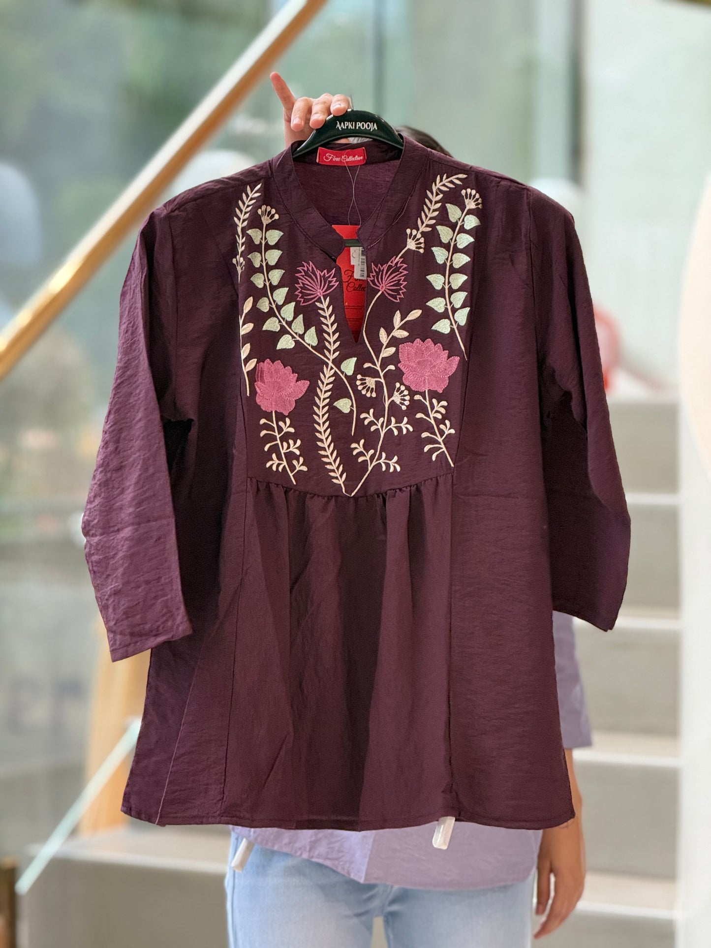Neckline embroidered top