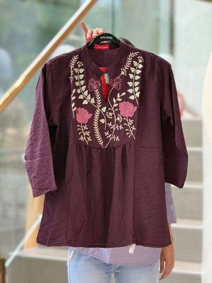 Neckline embroidered top
