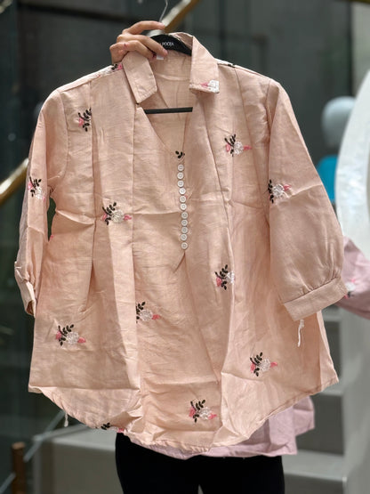 Embroidered top with button detail