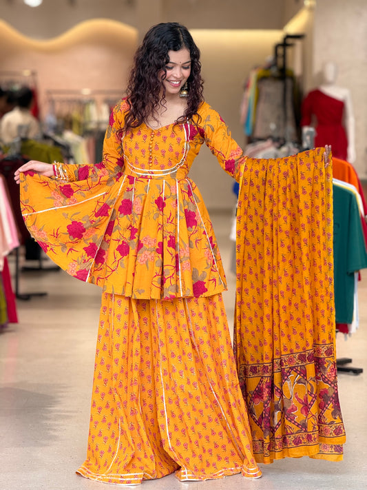mustard yellow peplum crop top and gher plazo with dupatta suit set