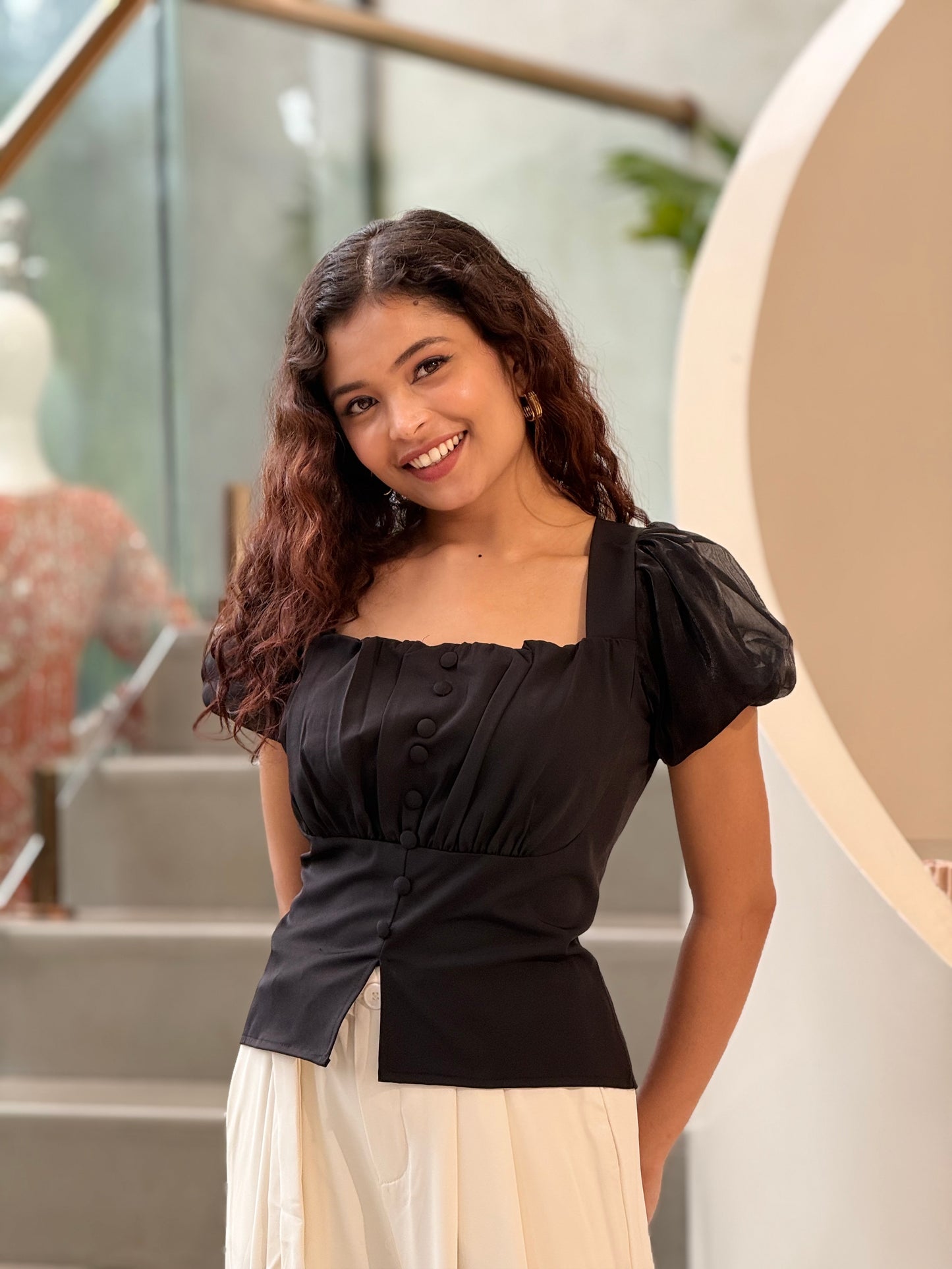 Partywear top with puff sleeves