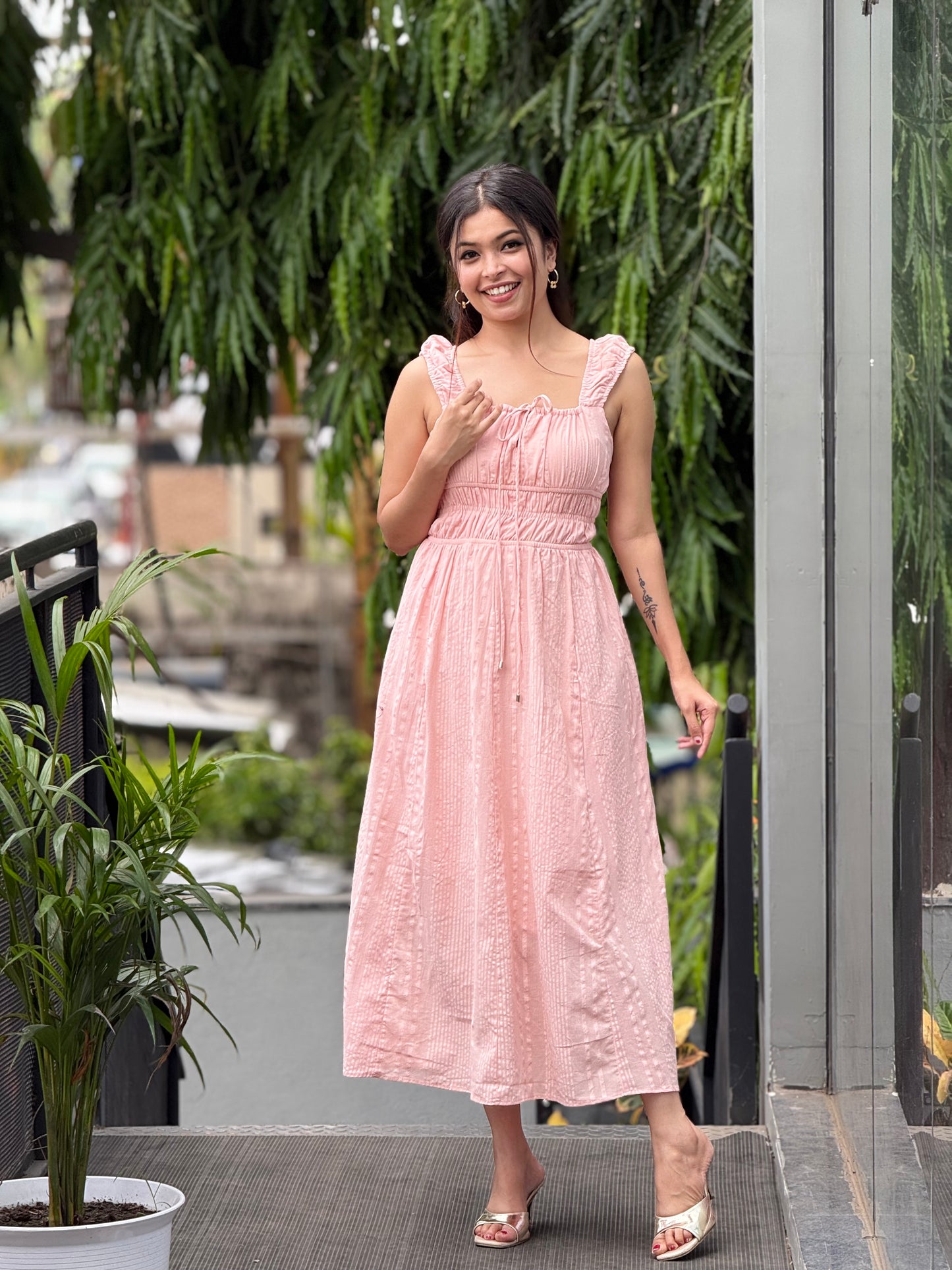 Pink pne piece dress with strap back
