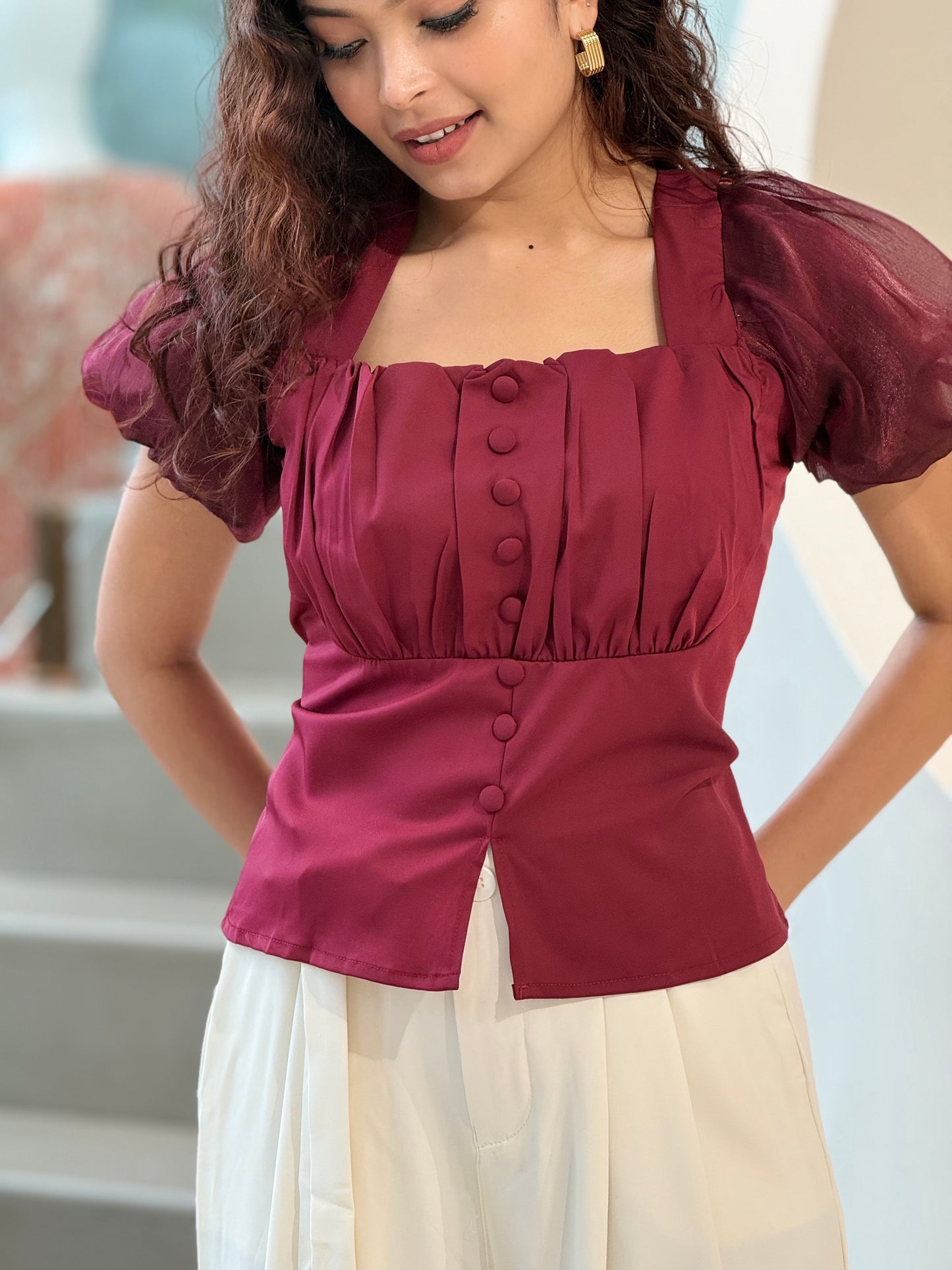 Partywear top with puff sleeves