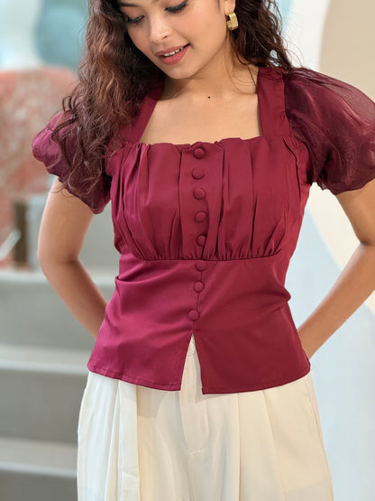 Partywear top with puff sleeves